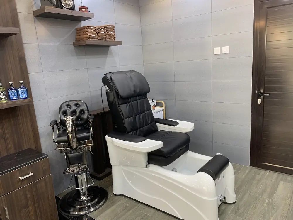 The pedicure chair and barber chair in the grooming room